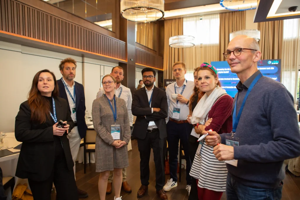 Conference attendees participate in a small-group discussion session at the 6th Digital Health Conference