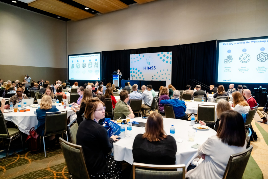 Speaker presenting at the HIMSS 2025