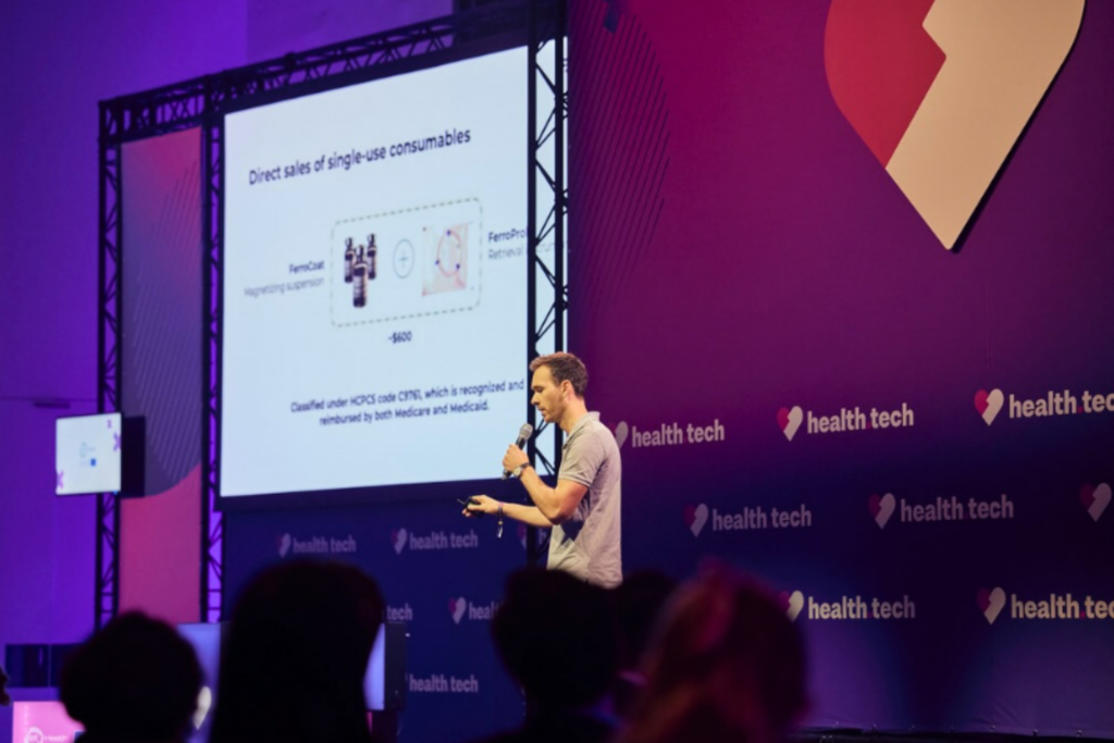 Speaker presenting at the HealthTech Conference 2025 stage