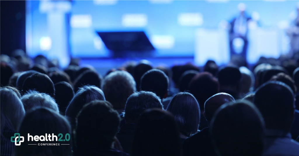 Attendees listening to a discussion at Health 2.0 Conference