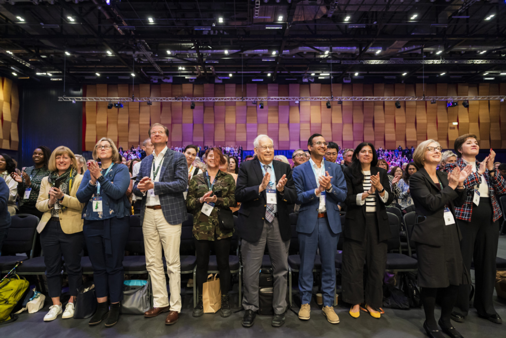 Attendees applaud speaker at International Forum on Quality and Safety in Healthcare