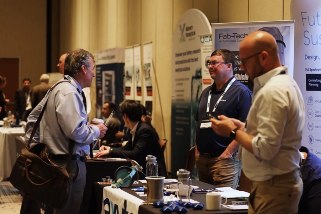 Attendees networking with healthcare experts at the Health AI Summit 2025